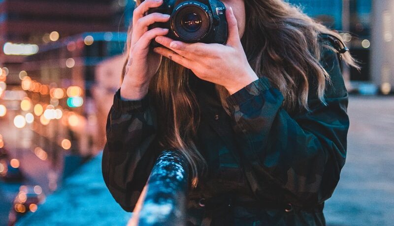 woman using camera