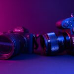 black nikon dslr camera on blue surface