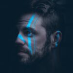 shallow focus photo of man