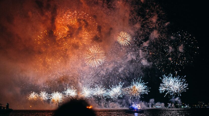 fireworks near body of water