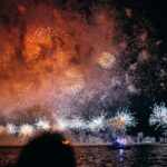 fireworks near body of water