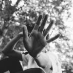 person holding it's head