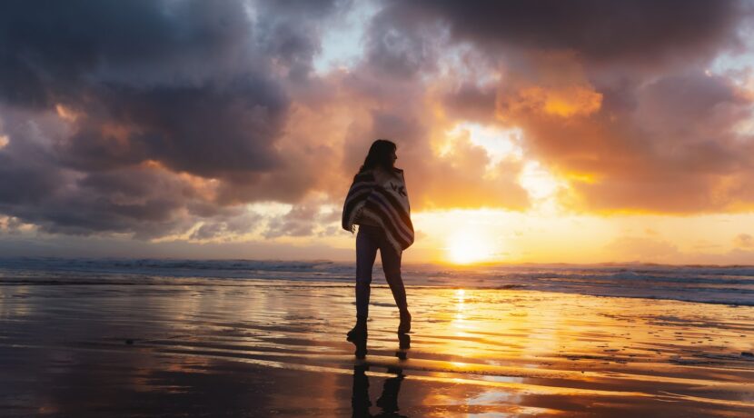 a person standing on a beach