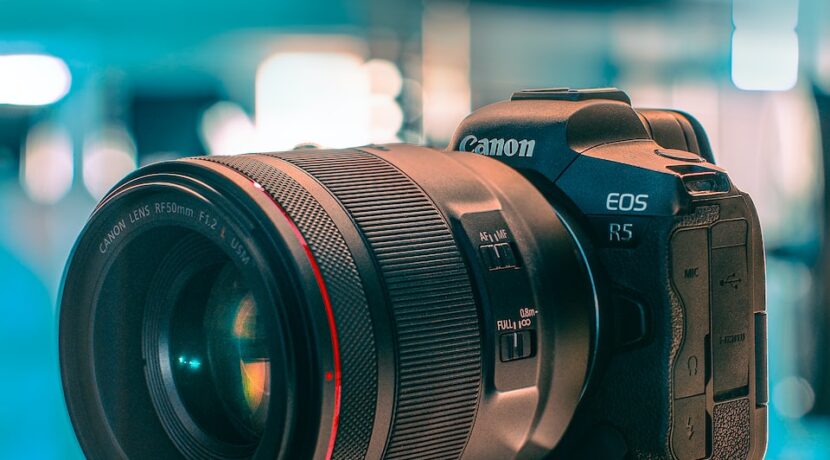 black nikon dslr camera on red stand