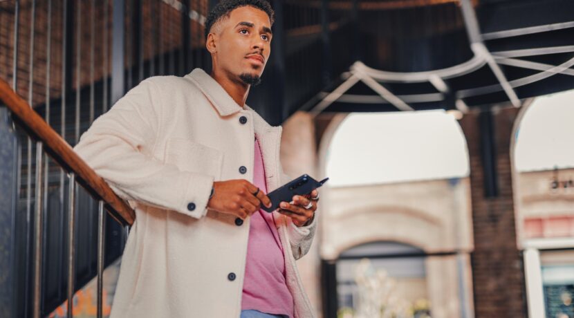 a man holding a tablet