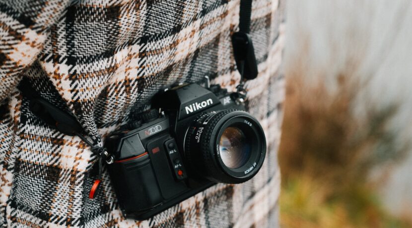 a camera attached to the back of a jacket