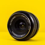 black DSLR camera lens