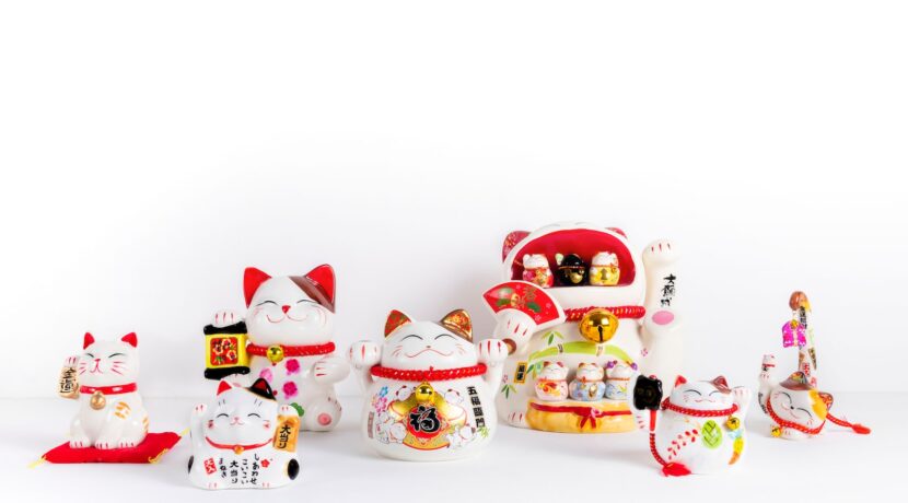 white red and yellow ceramic snowman figurines