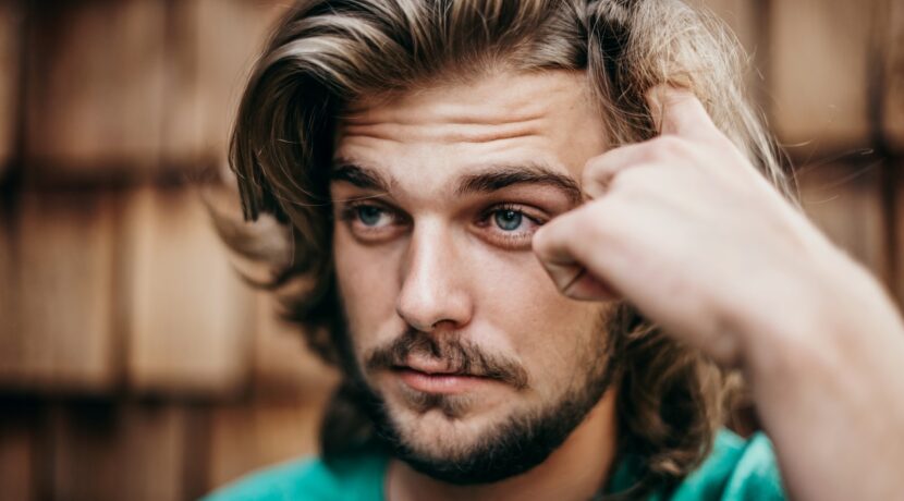 man in green crew neck shirt