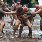 a group of men playing a game of rugby