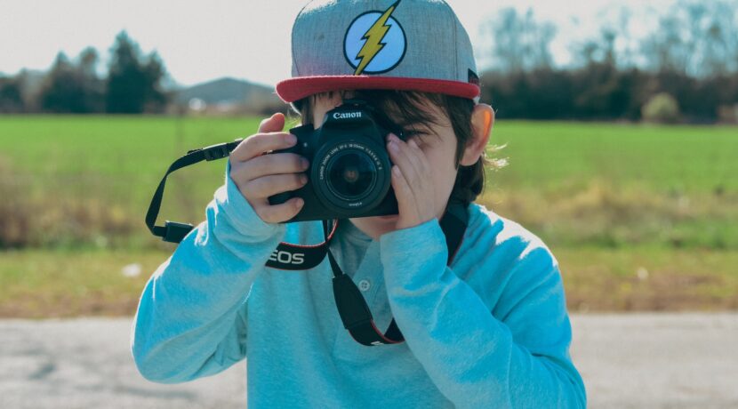 a person taking a picture with a camera