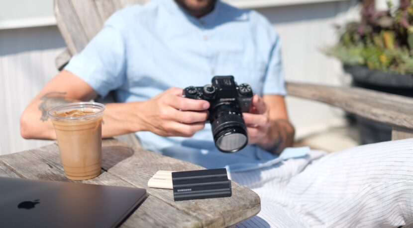 a man holding a camera