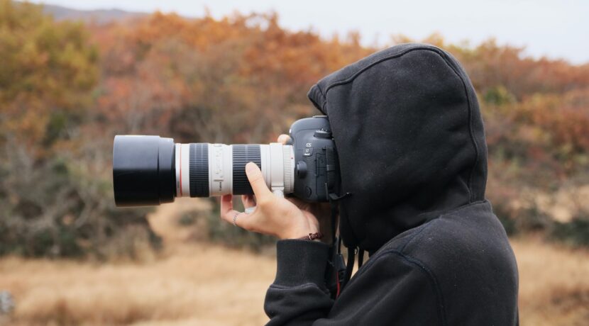 person holding camera