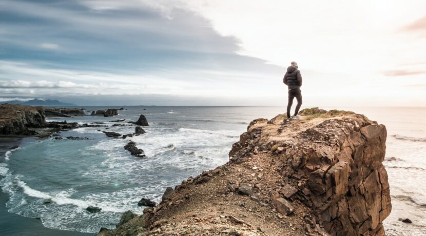 man on edge of cliff