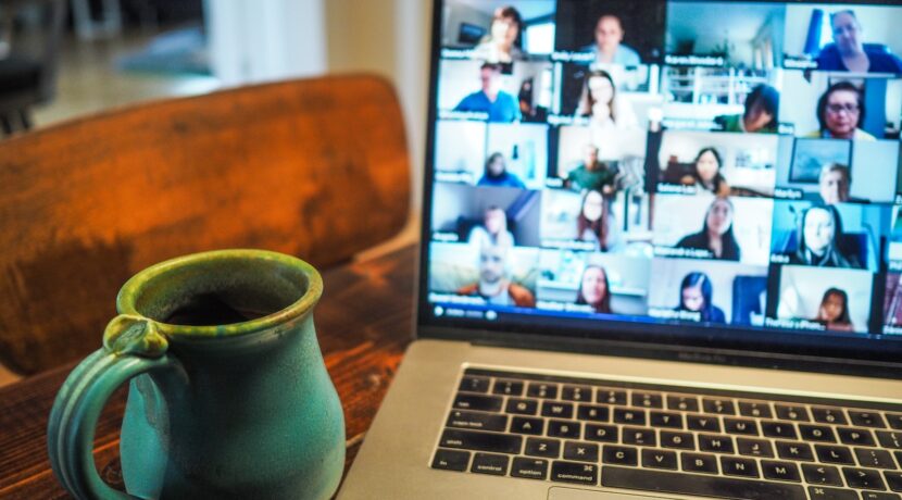 macbook pro displaying group of people