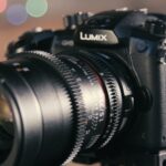 shallow focus photography of black Lumix DSLR camera