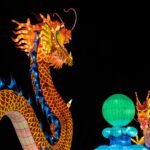 orange and blue lighted dragon statue