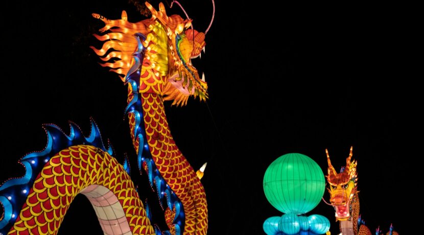 orange and blue lighted dragon statue