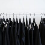black clothes hanged in rack