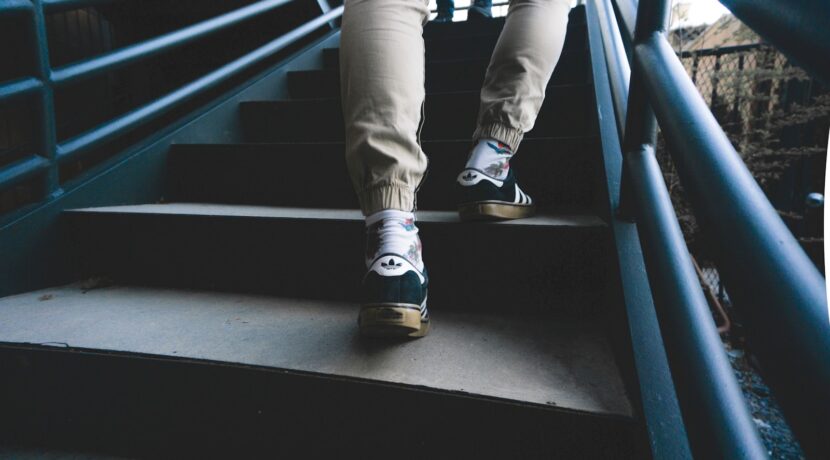 person walking on sairs