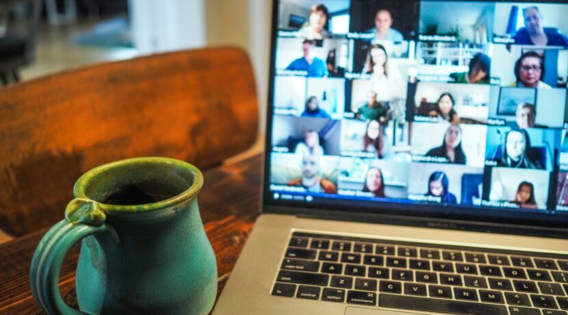 macbook pro displaying group of people