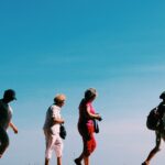 four people walking