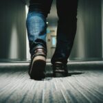 person walking on room