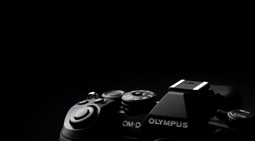 a close up of a camera on a black background