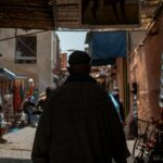 man walking on pathway
