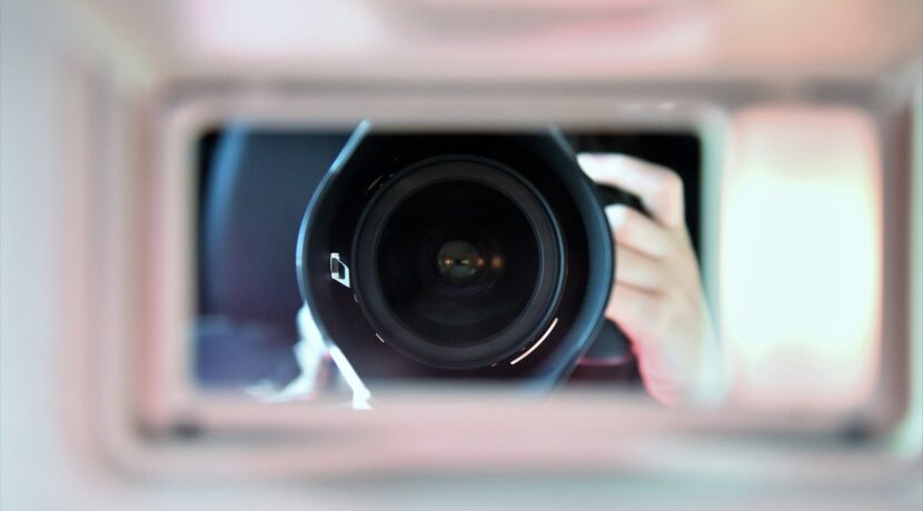 shallow focus photography of camera len